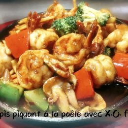Scampis piquant à la poêle avec X.O. flambé